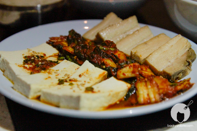 Steam Room - (Yummy and tender!) Beer Braised Pork Belly, sauteed kimchee, steamed tofu